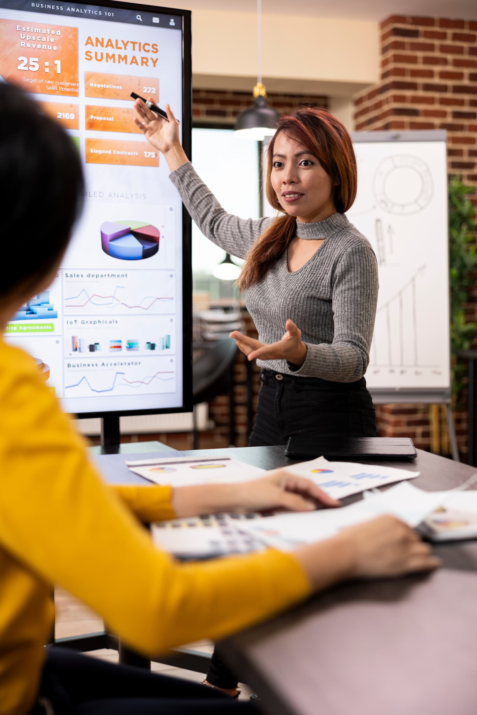 consultant-presents-company-growth-data.jpg